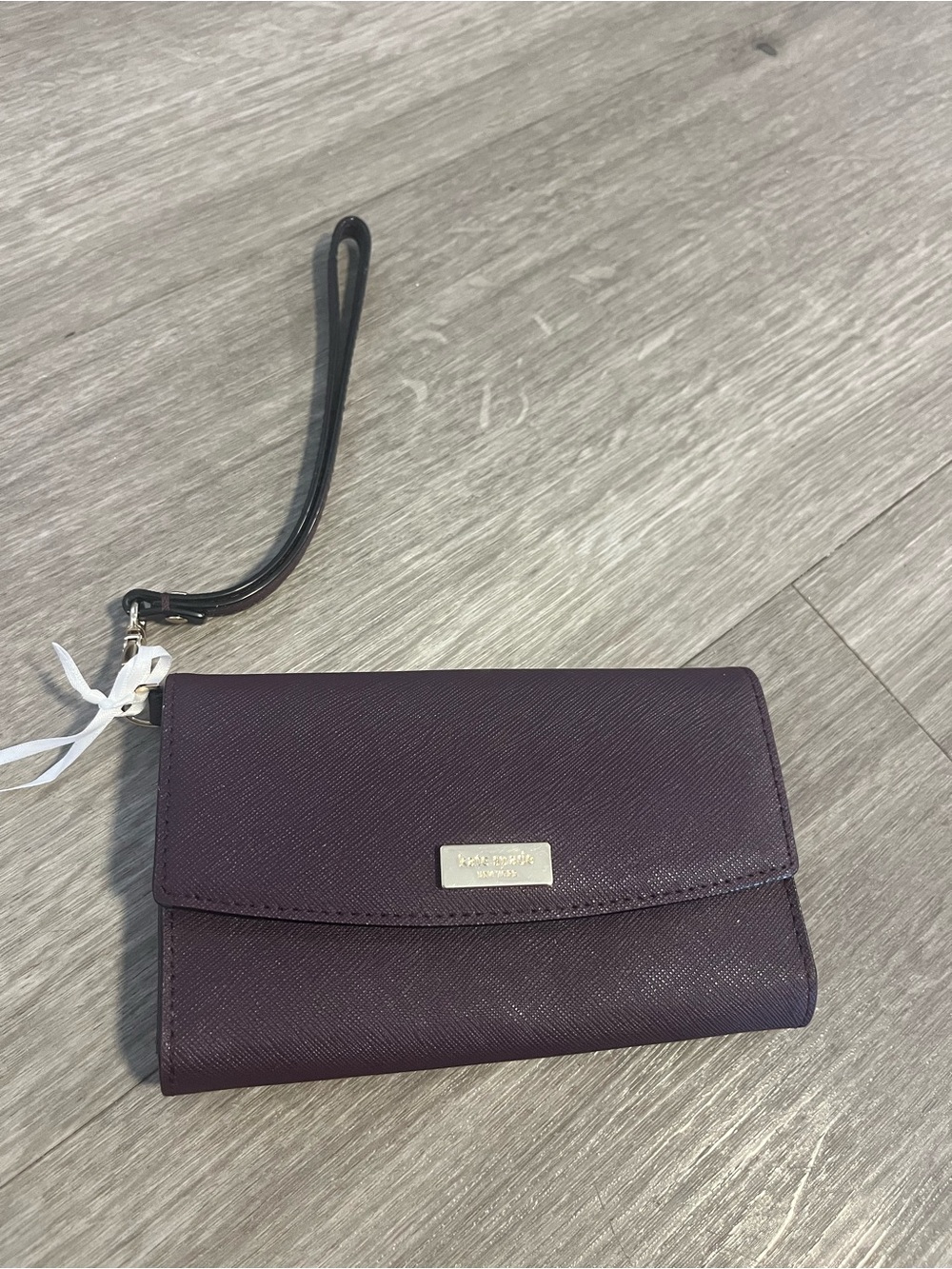 kate spade plum wristlet clutch with black strap